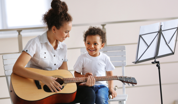 Mom-Practicing-guitar-with-Child